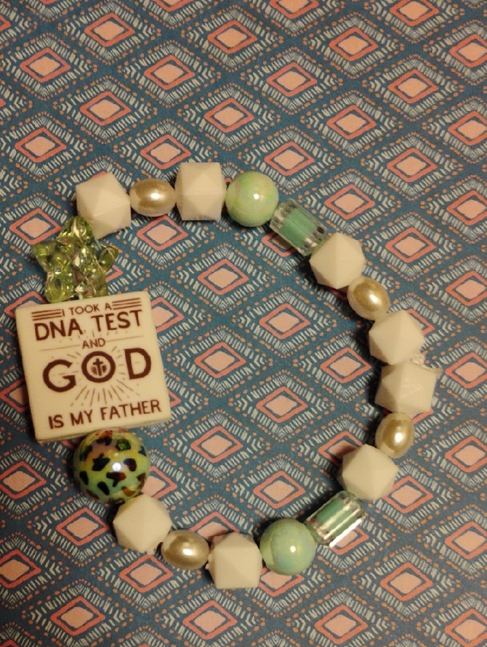 Religious Charm Beaded Bracelet with White Geometric Beads and Mint Accents